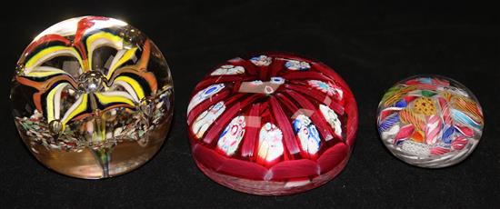 Three paperweights